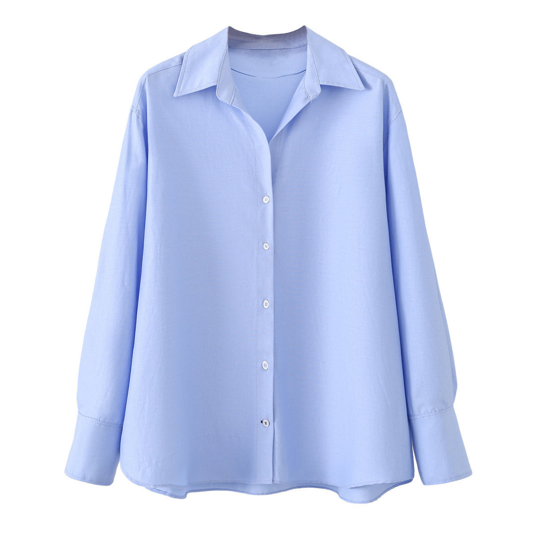 Women's oversized shirt blouse with a wide cut, long cuffed sleeves, and rounded hem Mune Fashion