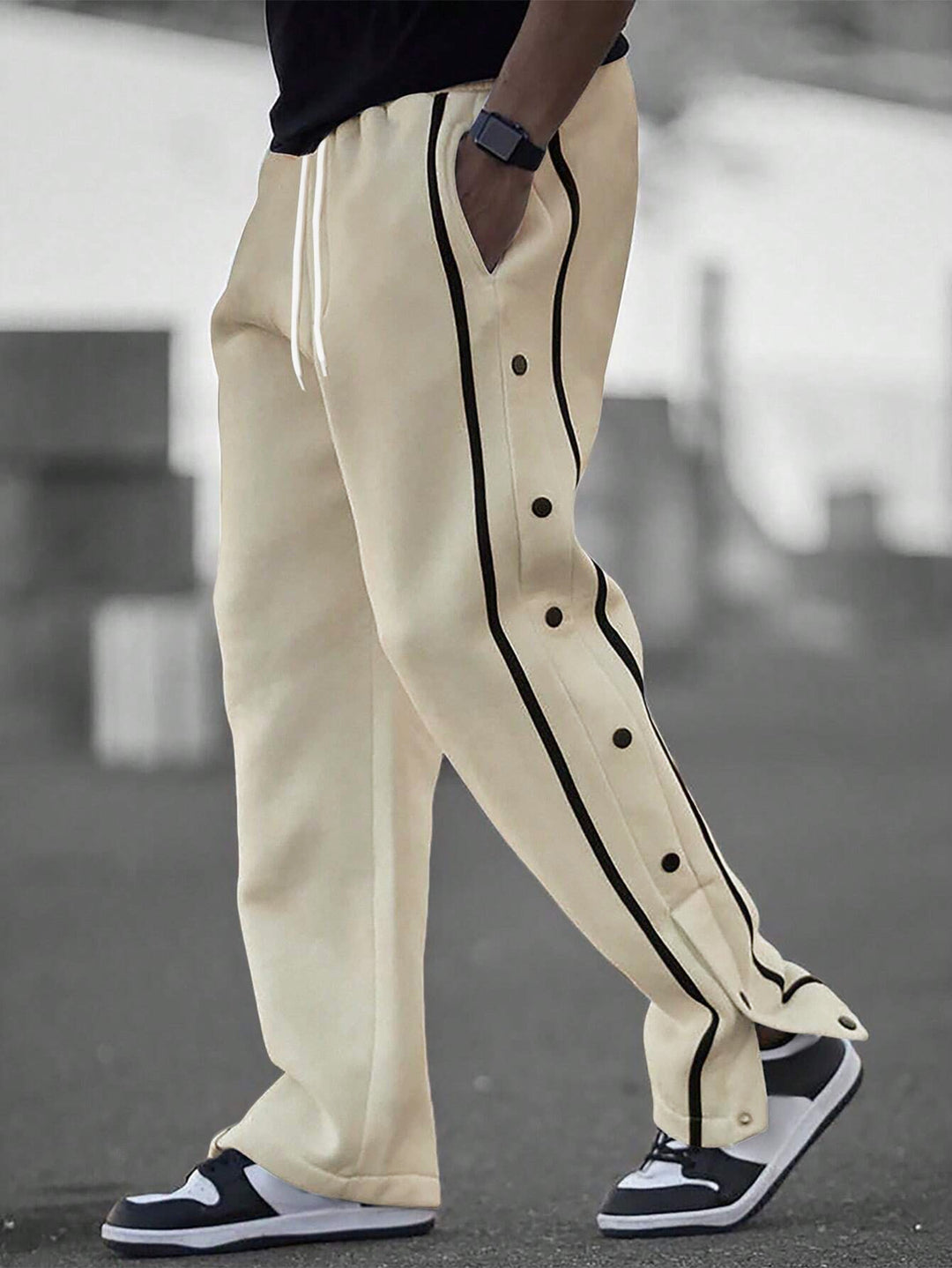 Men's casual training pants with side snap button placket, elastic waistband and contrasting piping Mune Fashion