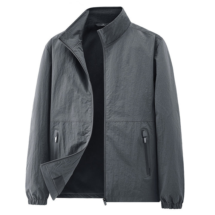 Men's minimalist functional jacket with stand-up collar, breathable mesh lining, and water-repellent zippers Mune Fashion