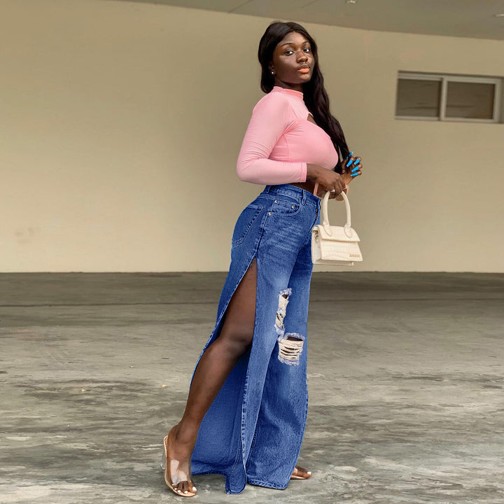 Ladies tapered denim jeans with high side slits and destroyed knee area Mune Fashion
