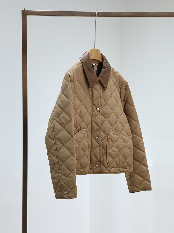 Women's quilted jacket with contrasting faux leather collar and boxy cut Mune Fashion