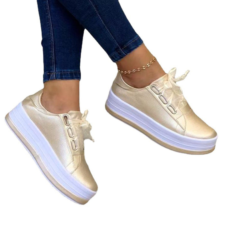 Women's platform sneakers with textured synthetic leather upper and extra high rubber platform Mune Fashion