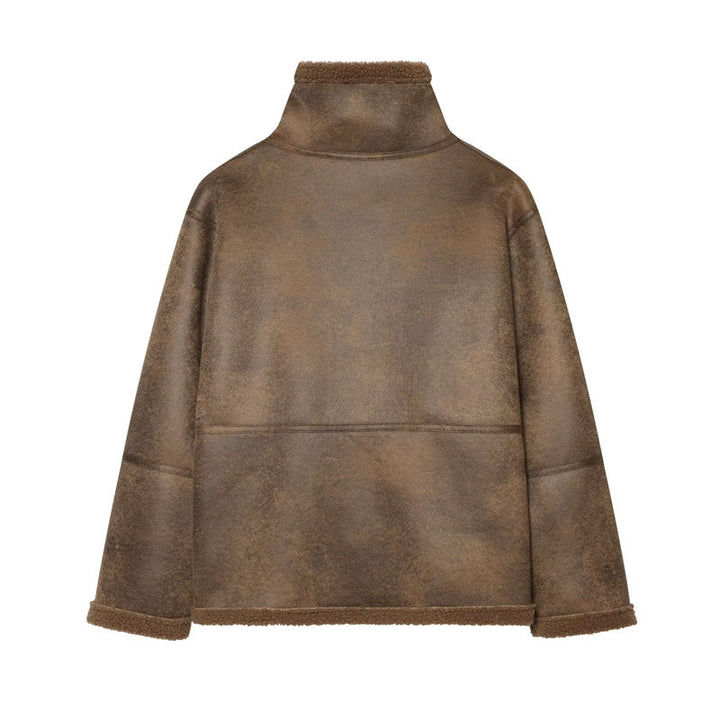 Ladies short jacket in lambskin look with stand-up collar, button and buckle closure Mune Fashion