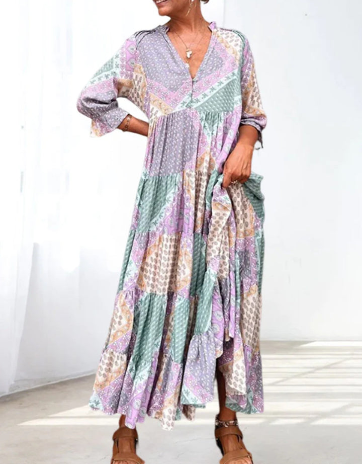 Women's airy maxi dress in patchwork boho style with V-neck, gathered bodice, and flared tiered hem Mune Fashion