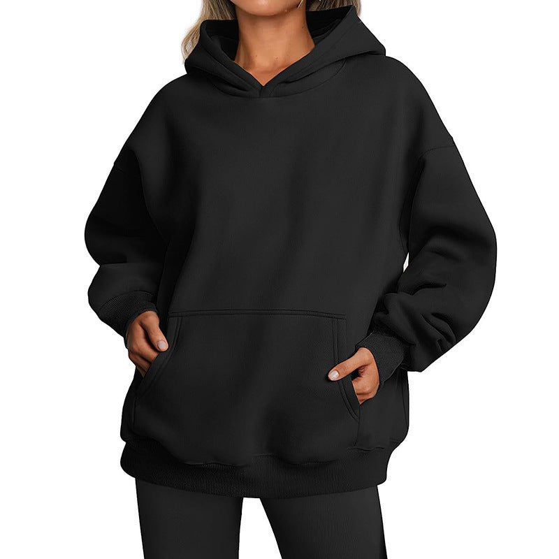 Women's oversized hooded sweatshirt made of soft cotton blend with kangaroo pocket Mune Fashion