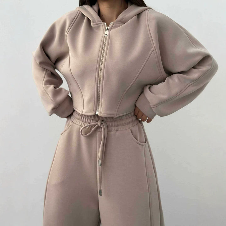 Women's loose high-waist lounge pants with drawstring, side pockets, and decorative seams Mune Fashion