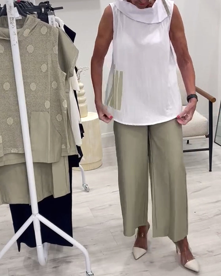 Women's sleeveless blouse top with wide shawl collar, relaxed A-line and side decorative yoke Mune Fashion