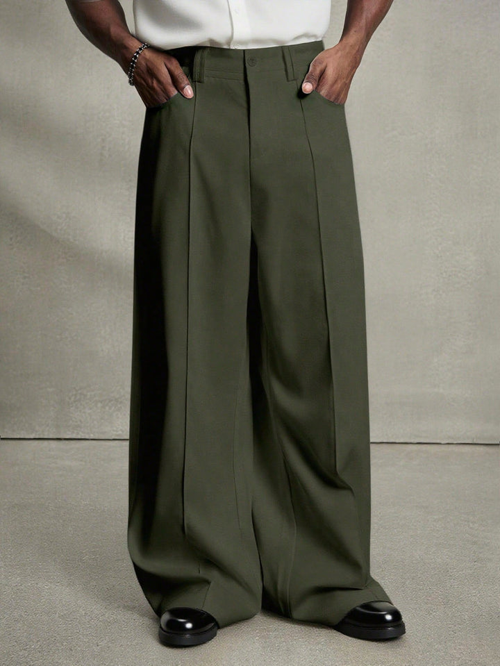Men's wide pleated pants with high waistband, precise creases, and side inset pockets Mune Fashion