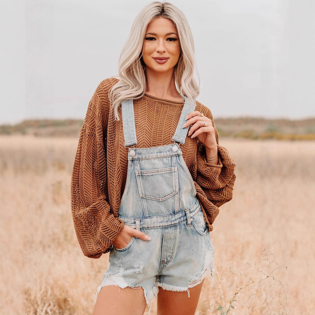 Women's oversized knitted sweater with wide boat neck, loose mesh knit and balloon sleeves Mune Fashion