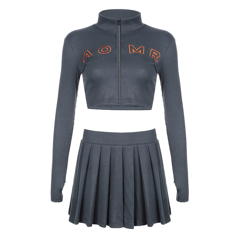 Women nano ribbed two-piece crop set with zipper, stand collar and pleated skirt Mune Fashion