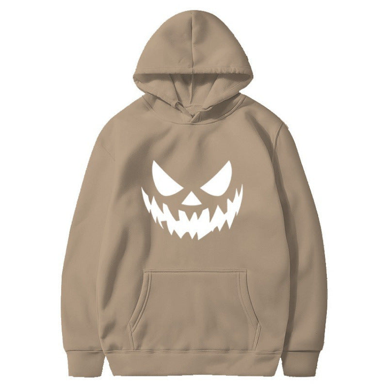 Unisex hooded sweatshirt with creepy pumpkin face print and oversized kangaroo pocket Mune Fashion
