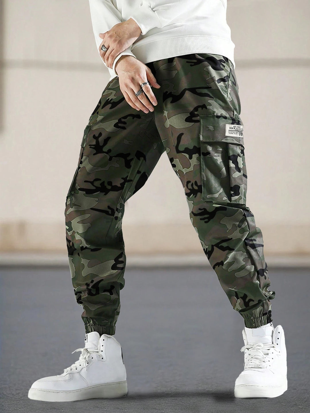 Men's cargo jogger pants with camo pattern, elastic waistband, and ankle cuffs Mune Fashion