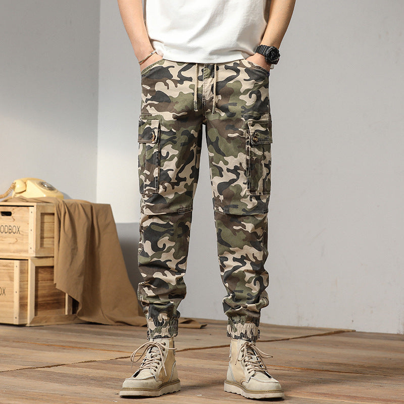 Men's tactical cargo jogger pants in camouflage look with drawstring waistband, reinforced knees, and cuffed hems Mune Fashion