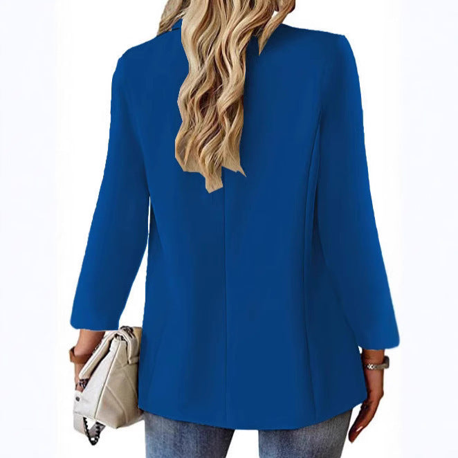 Ladies longline blazer in oversized style with a striking lapel, metal button, and patch pockets Mune Fashion