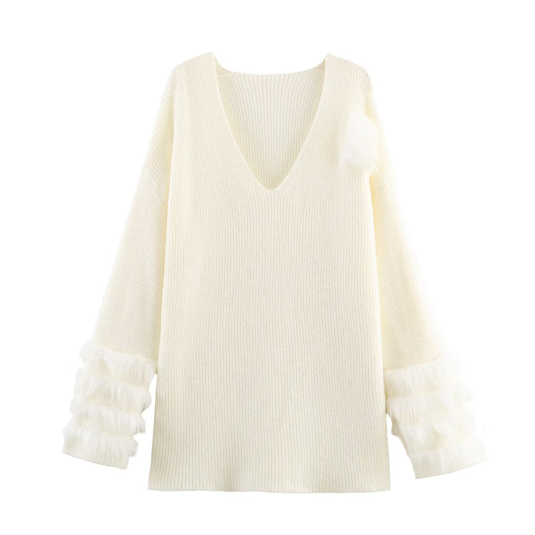 Ladies fine knit mini dress with deep V-neckline and layered faux fur sleeves Mune Fashion