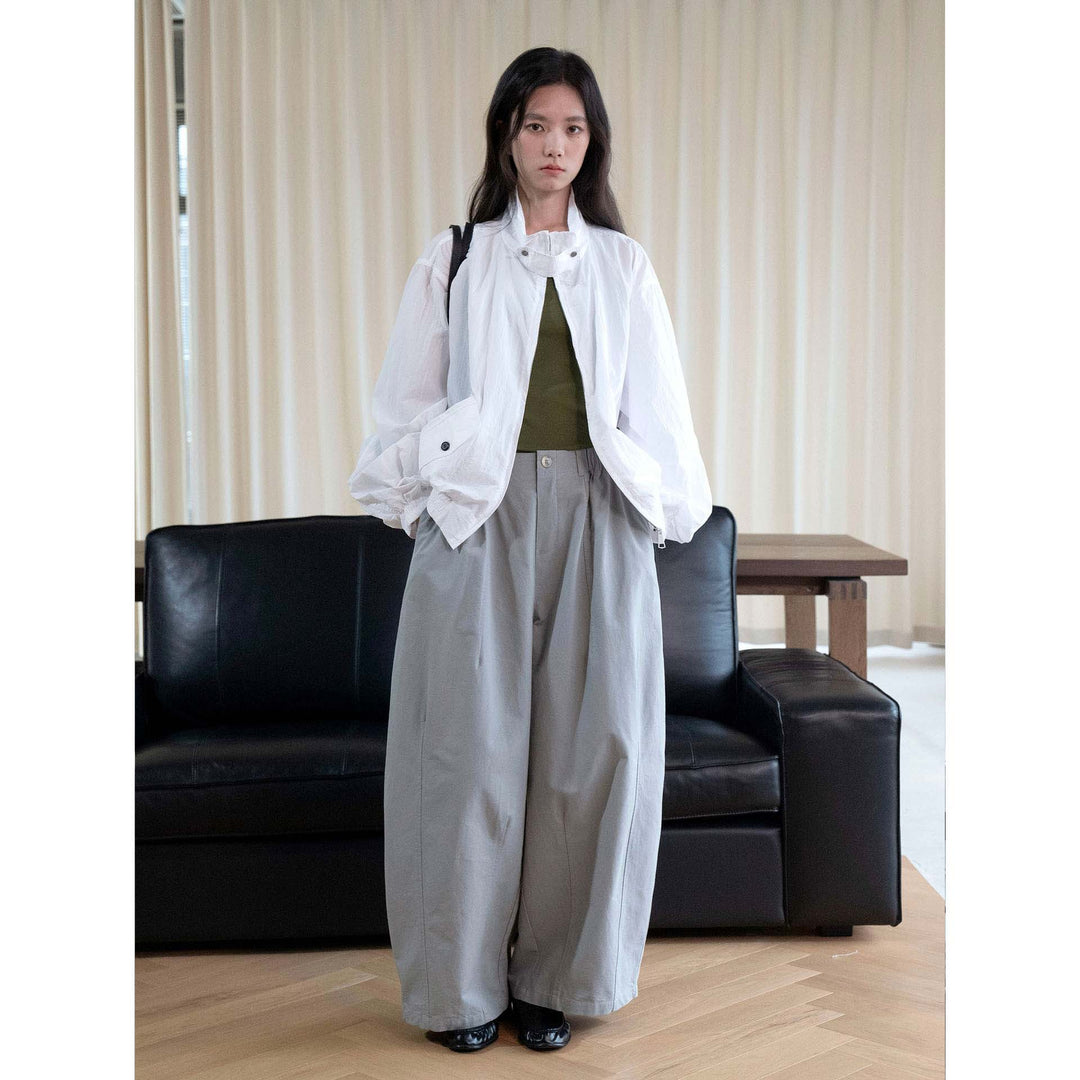 Women's high-waisted wide fabric trousers with concealed elastic waistband and crease Mune Fashion
