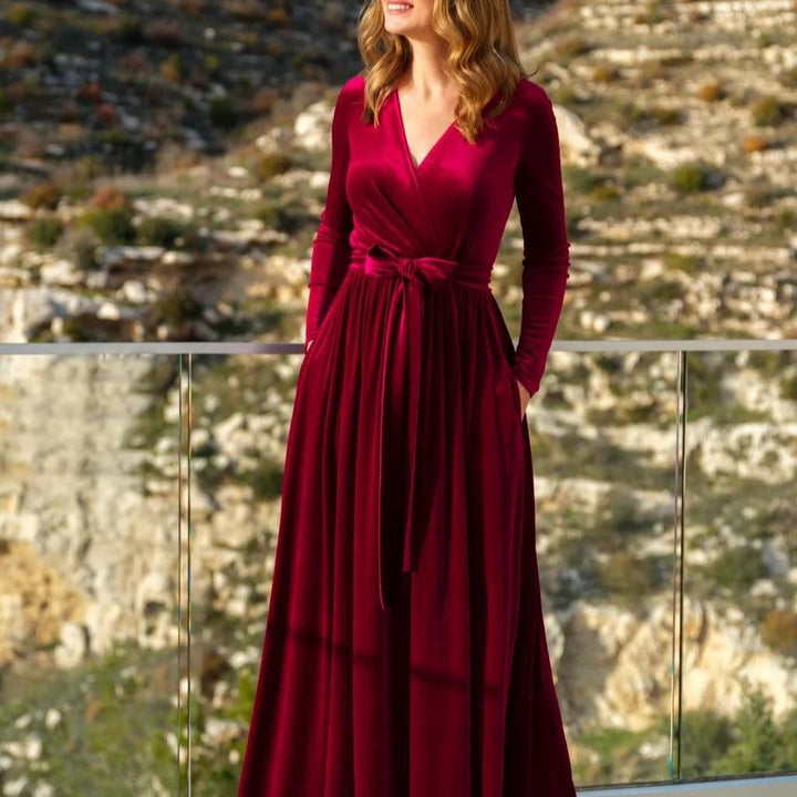 Women's elegant wrap maxi dress made of velvet with V-neck, waist belt, and side pockets Mune Fashion