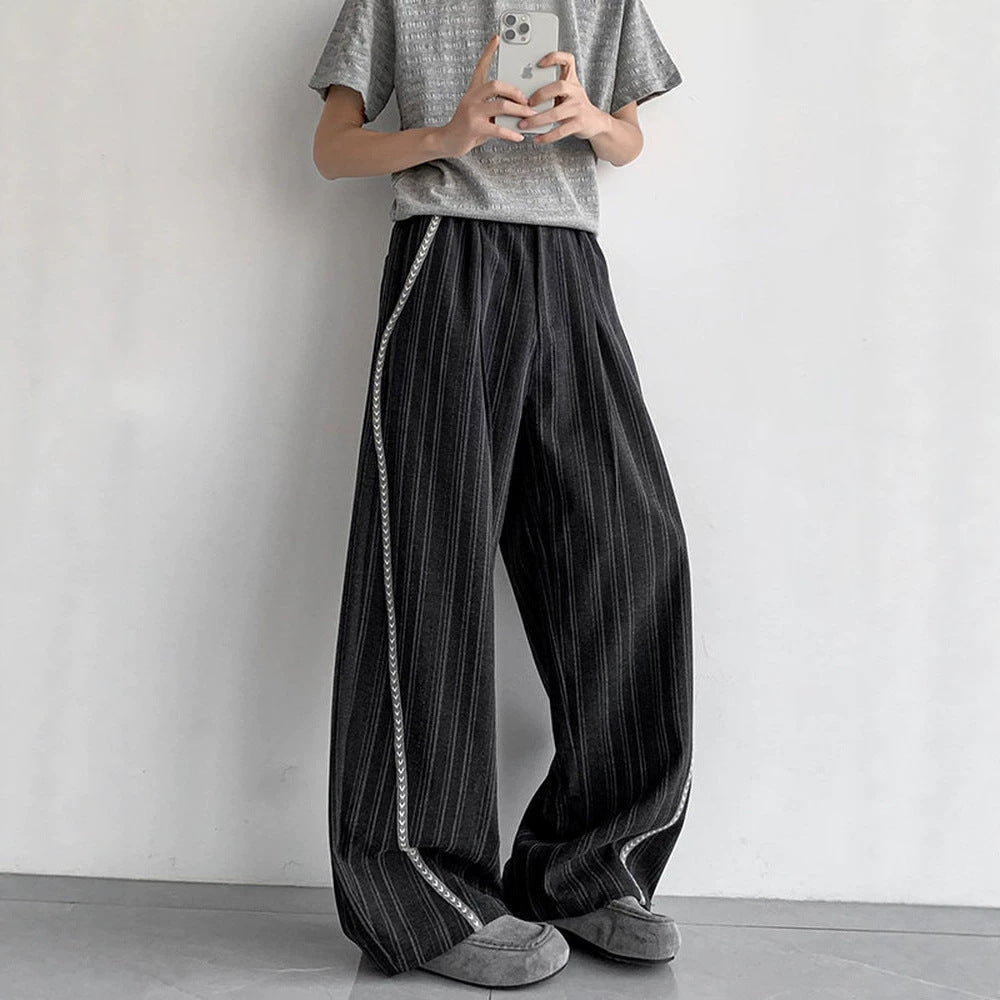 Men's loose baggy trousers in suit look with fine pinstripe and braided side piping Mune Fashion