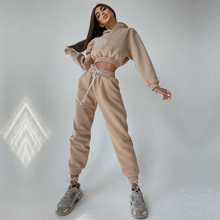 Women's cropped stand collar sweatshirt set with elastic waistband and high-waisted tapered joggers Mune Fashion