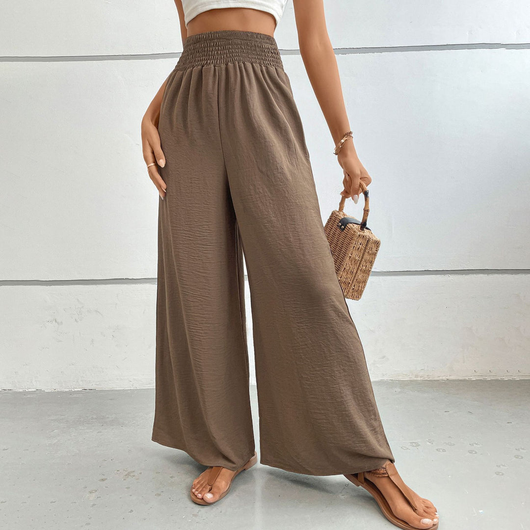 Women's palazzo pants with a high, elastic ruffled waistband and side pockets Mune Fashion