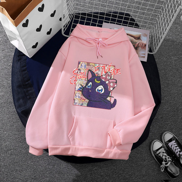 Women's oversized hoodie with shimmering anime cat motif, kangaroo pocket, and soft fleece lining Mune Fashion