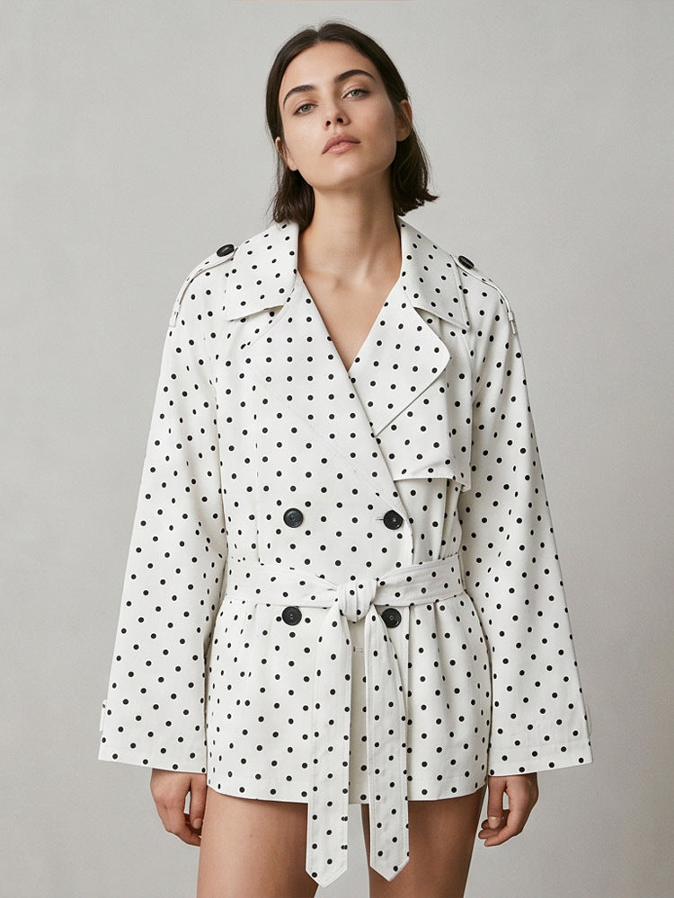 Women’s short trench coat with double breasted front, belt at the waist and polka dot print Mune Fashion