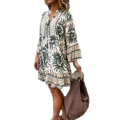 Women’s knee-length Boho tunic dress with V-neck, gathered empire seam, and ruffled hem Mune Fashion