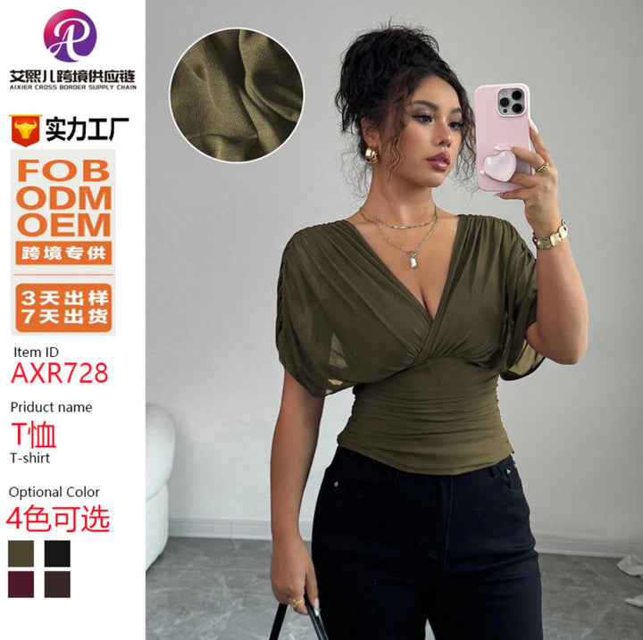 Women's fitted wrap top with deep V-neck and gathered wing sleeves Mune Fashion