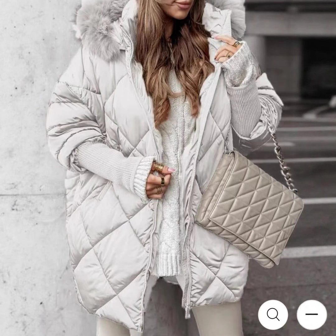 Women longer quilted winter parka with large hood and faux fur trim Mune Fashion