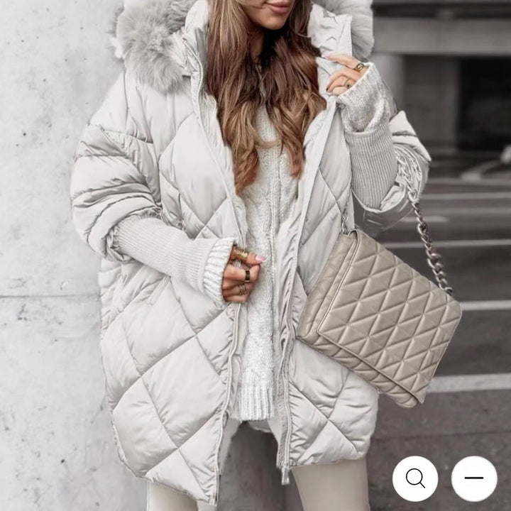 Women longer quilted winter parka with large hood and faux fur trim Mune Fashion