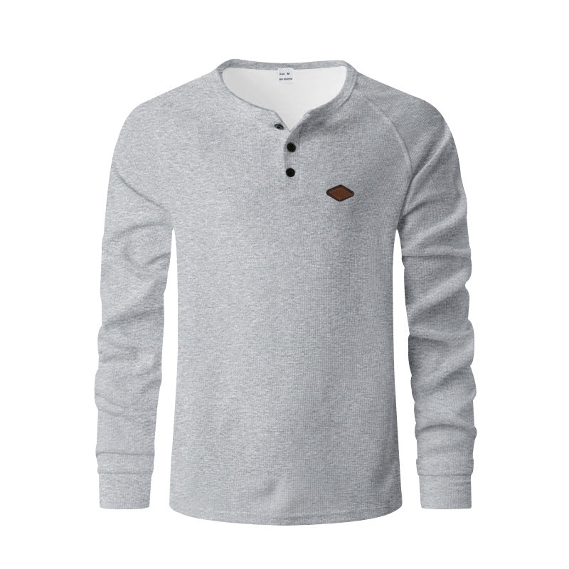 Men's structured long-sleeve shirt with short button placket, raglan sleeves, and subtle logo application Mune Fashion