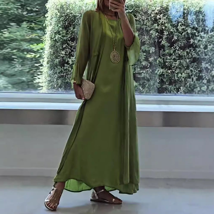 Women's double-layer evening maxi dress with transparent overlay, sleek inner dress, waist ties, and trumpet sleeves Mune Fashion
