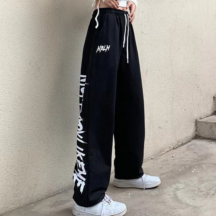 Women's high-waisted wide-leg jogging pants with a significant side print Mune Fashion