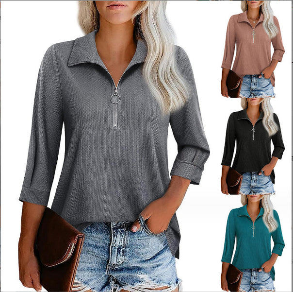Women's casual blouse with zip collar, three-quarter sleeves, and flared hem Mune Fashion