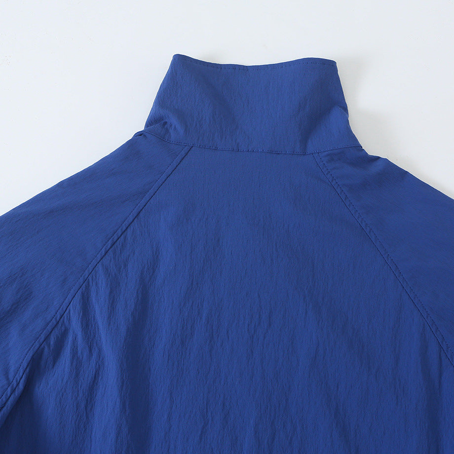 Women's Lightweight Cropped Windbreaker with Stand-Up Collar, Raglan Sleeves and Drawstring Mune Fashion