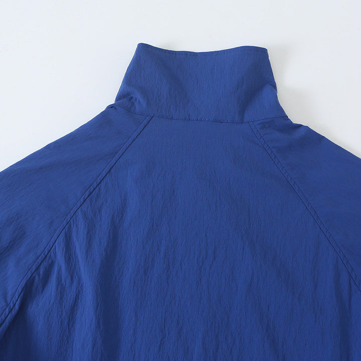 Women's Lightweight Cropped Windbreaker with Stand-Up Collar, Raglan Sleeves and Drawstring Mune Fashion