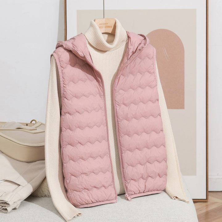 Women Ultra-light Hooded Quilted Vest with Ergonomic Wave Quilting and Compact Packing Format Mune Fashion