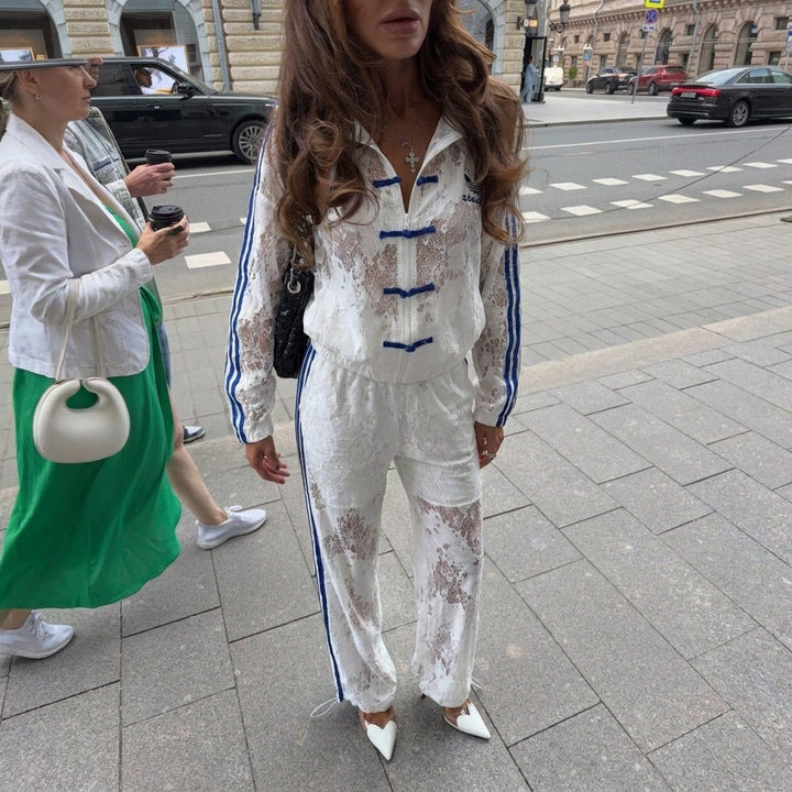 Women's two-piece lace lounge set with cropped hoodie, drawstring pants, and side contrast stripes Mune Fashion