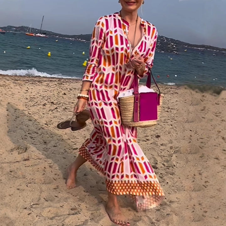 Women's flowing maxi dress with graphic all-over print, V-neck and three-quarter sleeves Mune Fashion