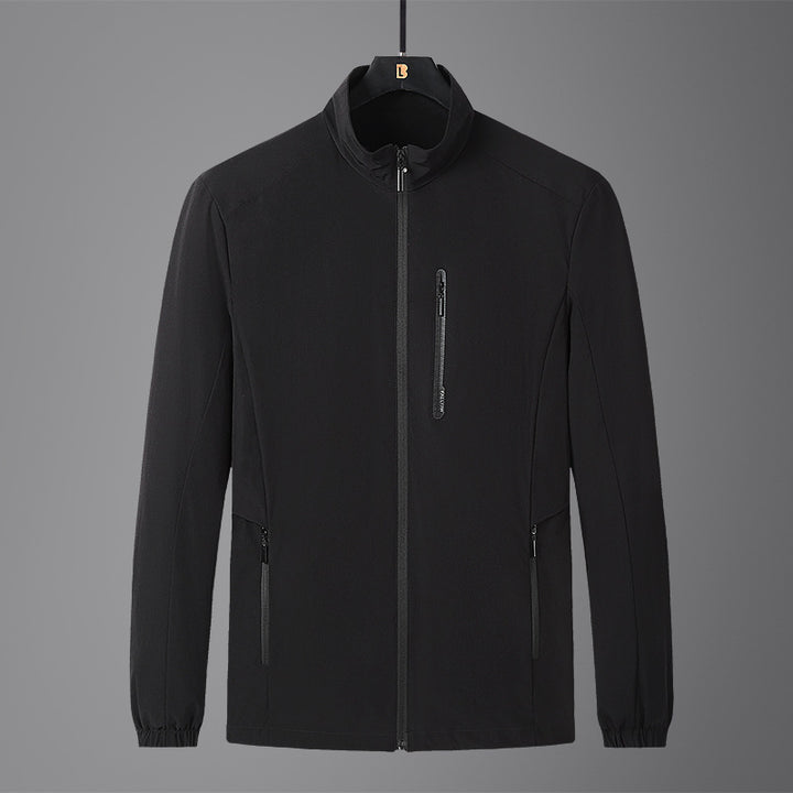 Men's Lightweight Softshell Jacket with Stand-Up Collar, Wind and Water-Repellent Surface, and Zipper Pockets Mune Fashion