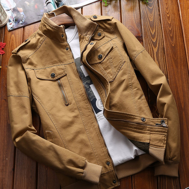 Men's lightweight canvas utility jacket with quilted lining, concealed two-way zipper, and elastic cuffs.