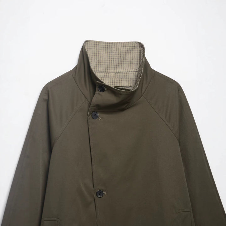 Women's short cape coat with high stand-up collar, concealed button placket and slanted pockets Mune Fashion