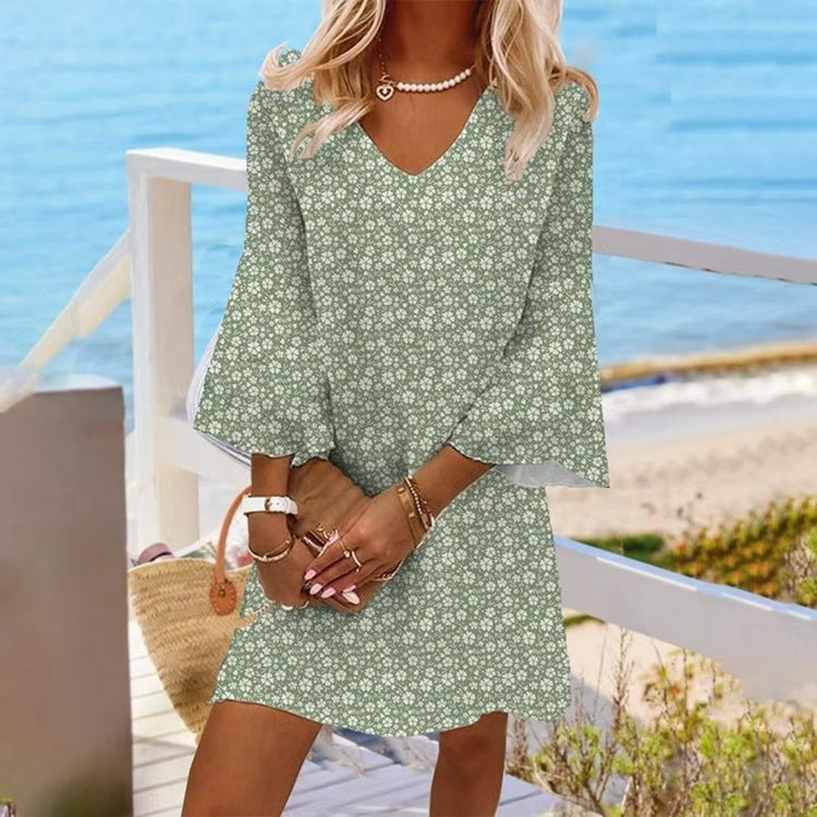 Women's light floral V-neck mini dress with bell sleeves and A-line cut Mune Fashion