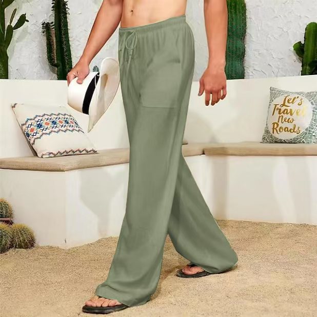Men's wide linen pants with drawstring, applied side pockets and relaxed fit Mune Fashion