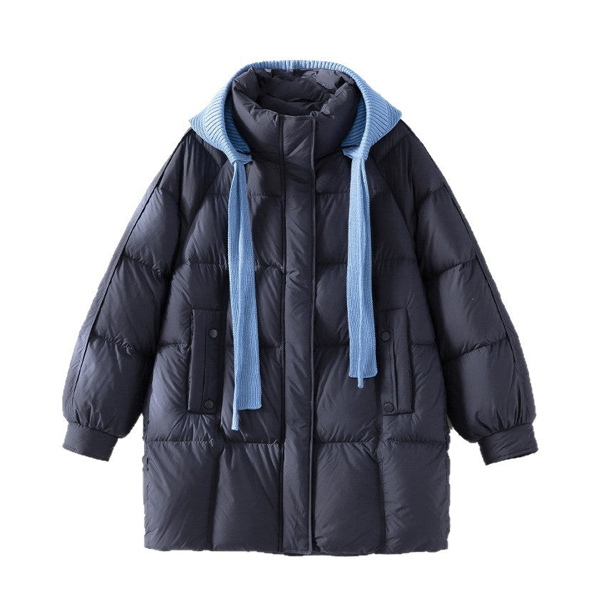 Women's padded quilted jacket with hood ribbed collar loose fit and midi length Mune Fashion