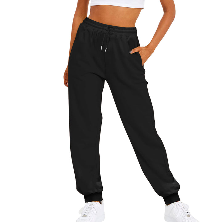 Women's comfortable jogging pants with drawstring, side pockets, and ribbed ankle cuffs Mune Fashion