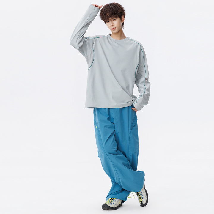 Damen Oversize-Langarmshirt aus Waffel‑ und Jersey‑Mix mit kontrastierenden Flatlocknähten Mune Fashion