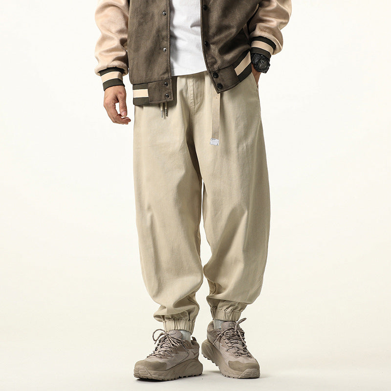 Men's wide relaxed cargo pants in jogger style with elastic tunnel drawstring waistband and cord decoration Drune