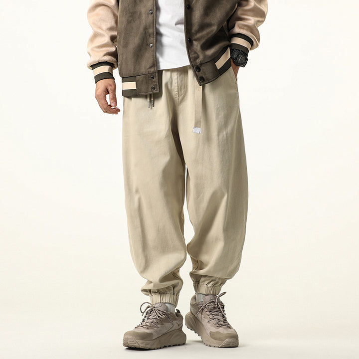 Men's wide relaxed cargo pants in jogger style with elastic tunnel drawstring waistband and cord decoration Drune