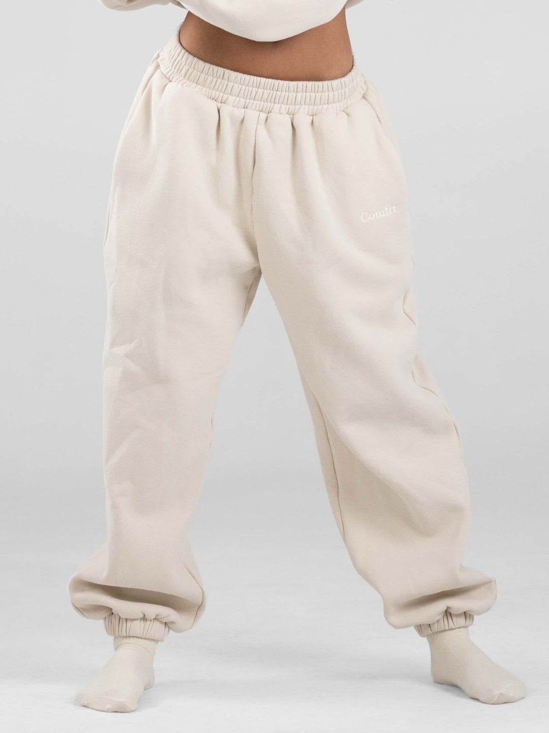 Women's casual sweatpants with high waistband, side pockets and elastic cuffs Mune Fashion